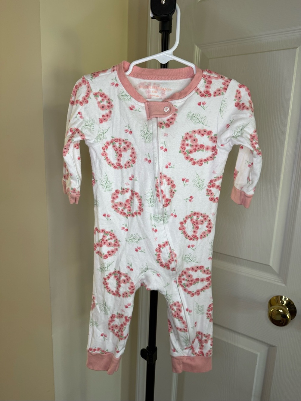 White Baby Footie with Pink Floral Peace Sign Print